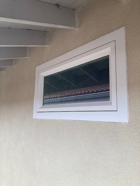 White vinyl awning window